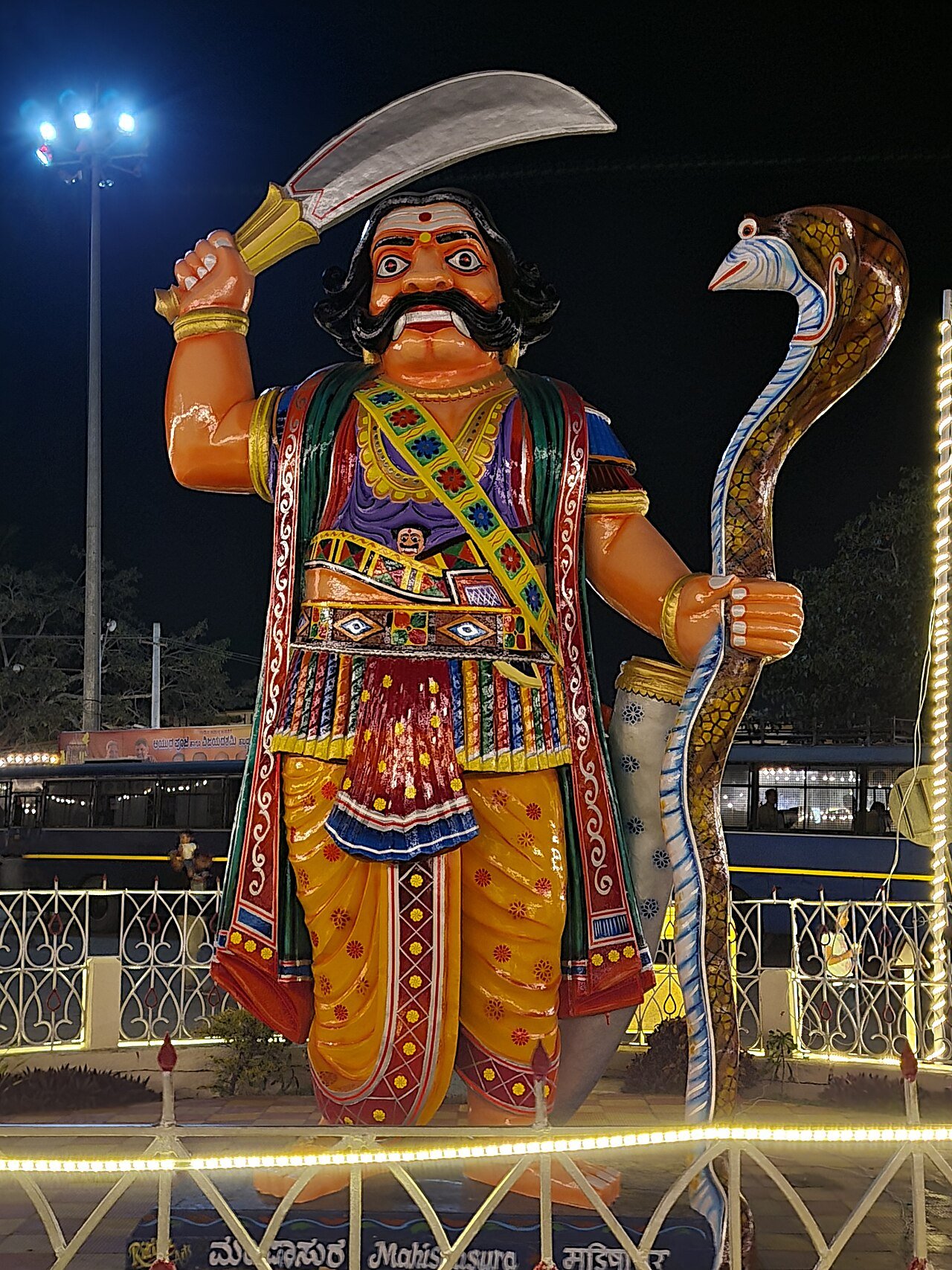 Mahishasura Statue at Chamundi Hill Summit with Sword and Cobra